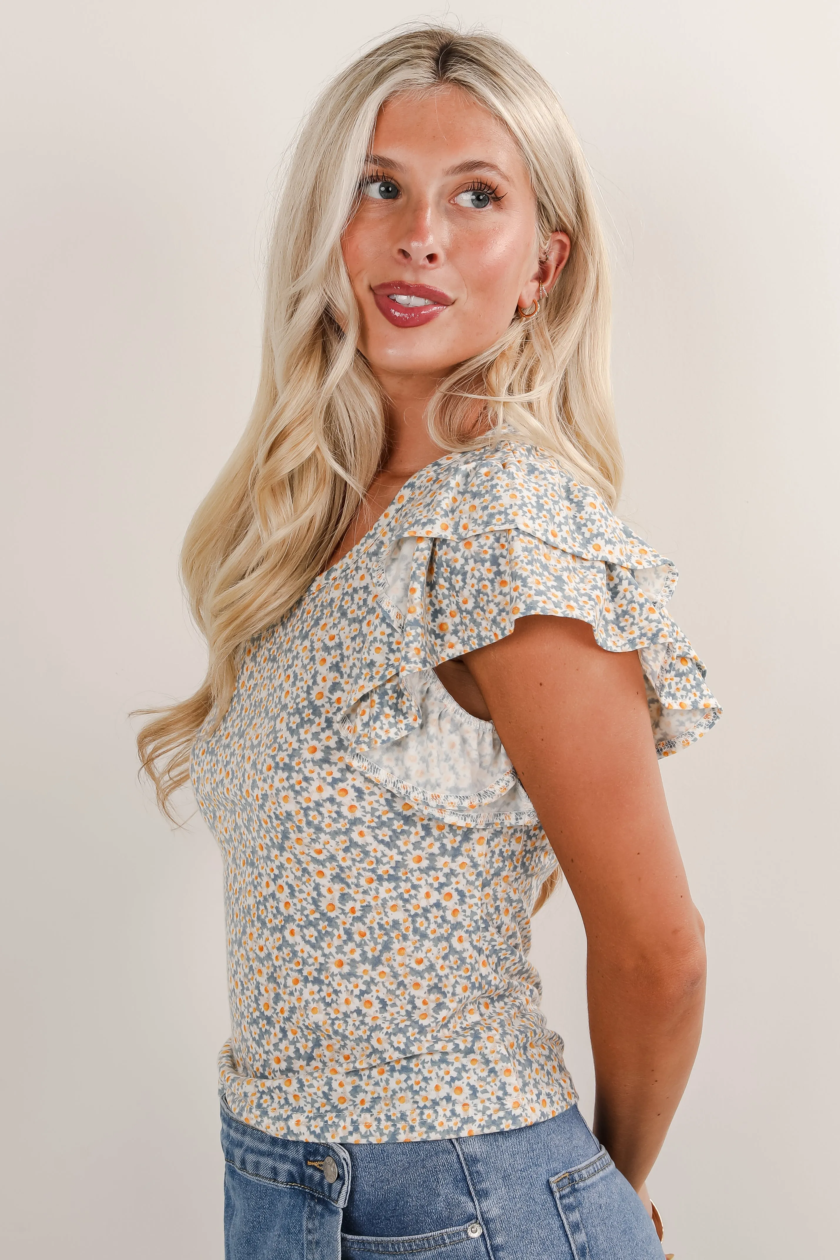 All The Fun Blue Floral Ruffle Top
